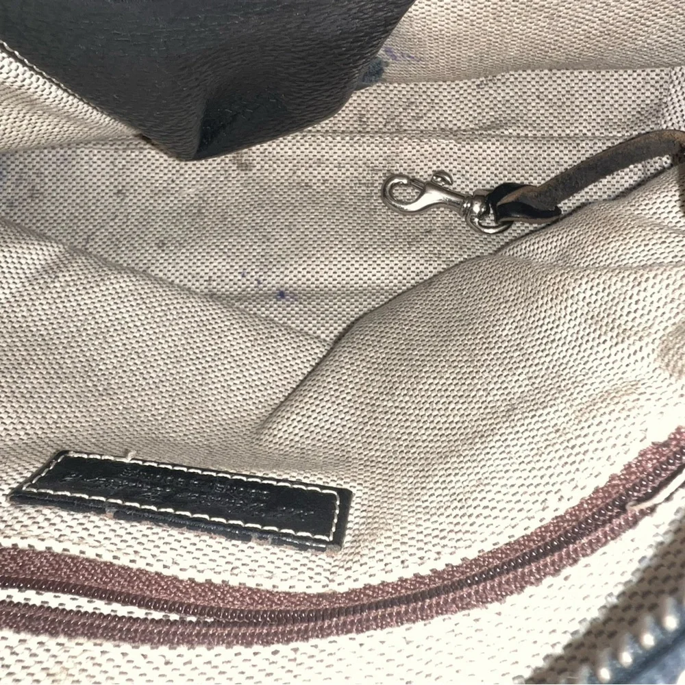 Pristine Condition Dooney and Bourke Pebble Grain Leather Black Backpack